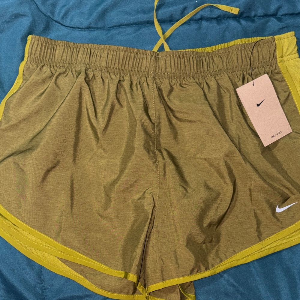 Nike Women's Athletic Shorts in Olive (green) and a lighter olive trim